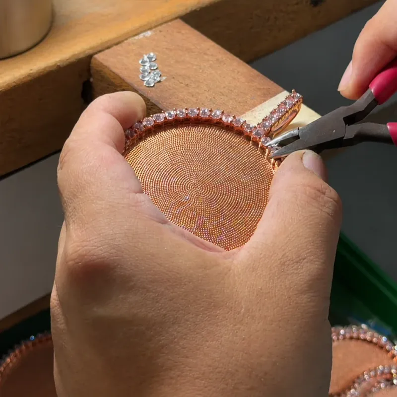 Hand stone setting and rim detail work